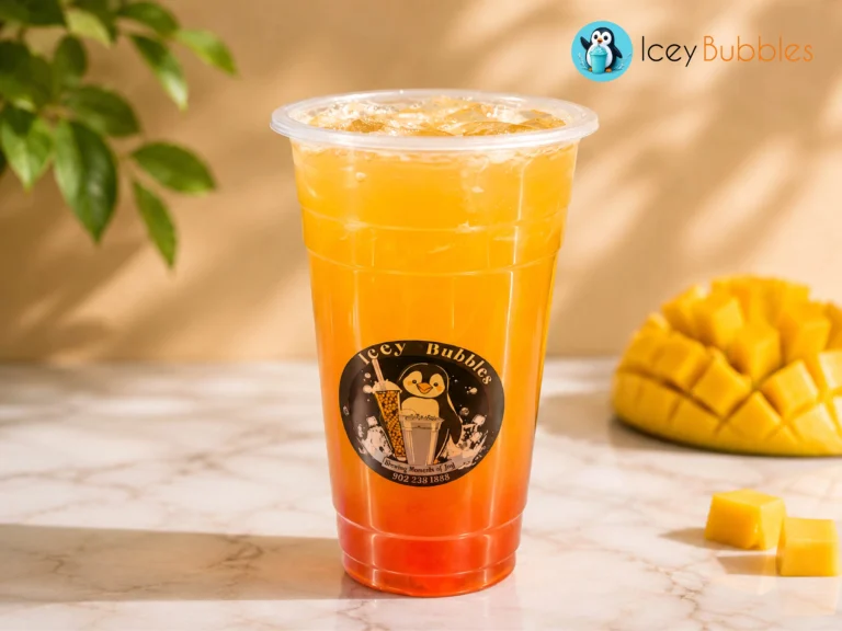 Layered mango fruit tea with fresh mango garnish from Icey Bubbles in Ajax
